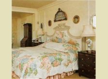 Elaborate hand carved and painted headboard and cornice
